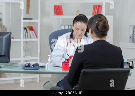 woman patient consultation in hospital or surgery office Stock Photo