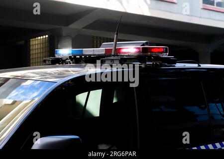 Part of Police vehicle with flashlights Stock Photo