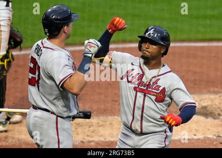 Atlanta, GA, USA. 04th July, 2019. Atlanta Braves shortstop Dansby Swanson  (left) kisses the head of infielder Ozzie Albies (right) after hitting an  eighth inning home run during a MLB game against