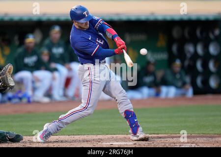 Mitch Garver helps Rangers rally past A's