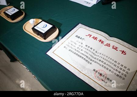 **CHINESE MAINLAND, HONG KONG, MACAU AND TAIWAN OUT** Lunar soil samples collected by the Chinese lunar probe Chang'e-5 are displayed in the Universit Stock Photo