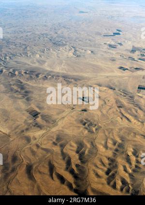 Aerial view of the Eastern Desert with agriculture farms in it. Jordan. Stock Photo