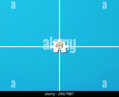 Branding or brand name concept. Brand symbol on a jigsaw puzzle piece on blue background. Stock Photo