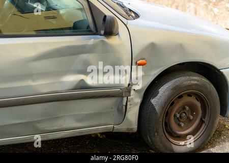 Big dent in the car door Stock Photo