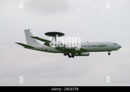 Boeing E-3A Sentry AWACS plane in service with NATO / OTAN. Landing at RAF Waddington, UK. (AEW&C) jet aircraft based on 707 airliner Stock Photo
