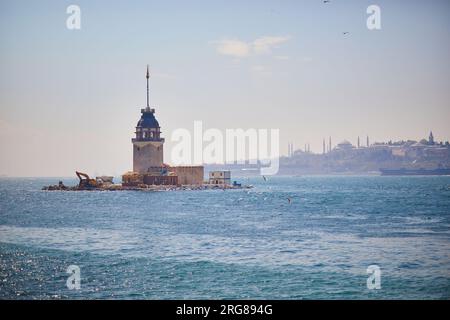 Scenic view to Maiden's tower in Uskudar distric on Asian side of the city across the Bosphorus strait in Istanbul, Turkey Stock Photo