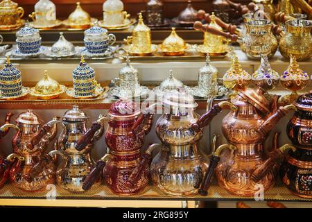 Beautiful tea and coffee sets on Egyptian Bazaar or Spice Bazaar, one of the largest bazaars in Istanbul, Turkey. Market sells spices, sweets, jewelle Stock Photo