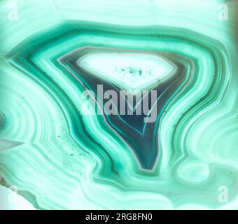 Thin slice of blue Agate with crystals in a geode, , lit from behind Stock Photo