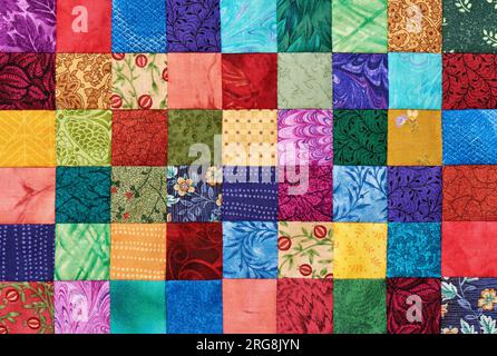Colorful detail of quilt sewn from square pieces Stock Photo