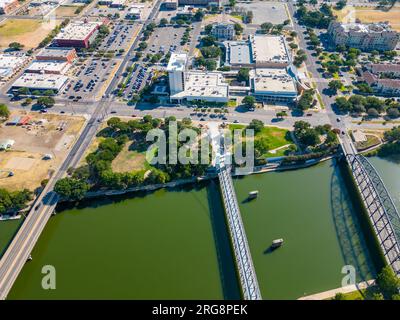 Waco, TX, USA - July 24, 2023: Aerial photo Waco Convention Center on Brazos River Stock Photo