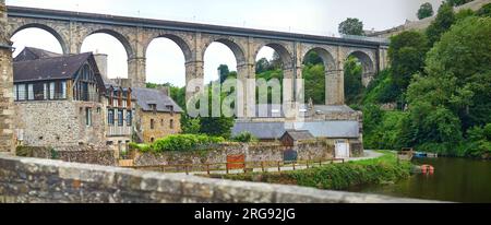 Panoramic scenic view of Dinan viaduct over the river Rance, one of the most popular tourist destinations in Brittany, France Stock Photo