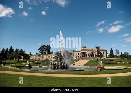 General view of Witley Court, Worcestershire, with the Perseus and Andromeda fountain in full flow in the foreground.  The 19th century mansion was ruined by fire in 1937, and restoration work is being undertaken by English Heritage. Stock Photo