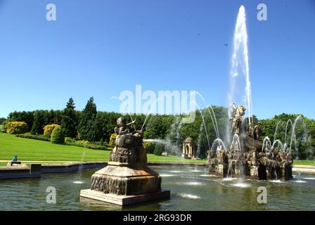 View of one of the fountains and part of the grounds at Witley Court, Worcestershire. The 19th century mansion was ruined by fire in 1937, and restoration work is being undertaken by English Heritage. Stock Photo