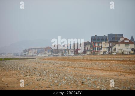 View of Villers-sur-Mer in Lower Normandy, France on a foggy day at low tide Stock Photo