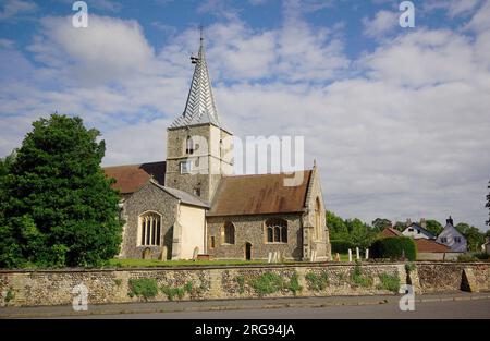 St Mary Magdalene parish church, Ickleton, Cambridgeshire, dating back to the 11th or early 12th century.  Near the top of the spire is a Tudor Sanctus bell. Stock Photo