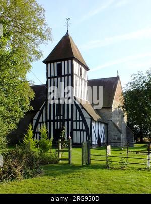 St Peter's Church, with an unusual black and white tower, in the village of Pirton, near Worcester, Worcestershire. Stock Photo