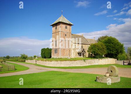 Parish church of St Mary the Virgin, a Grade I listed building in the village of Upleadon, Gloucestershire, dating back to the 11th century with later additions.  The tower, timbered and inlaid with red brick, dates back to the Tudor period. Stock Photo