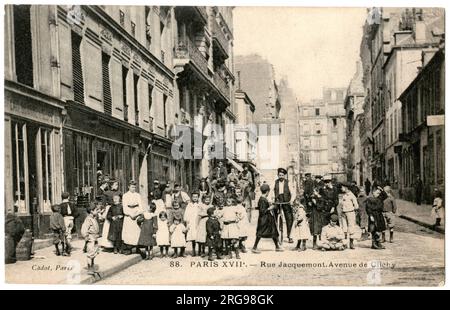 Rue Jacquemont, off the Avenue de Clichy, 17th arrondissement, Paris, France, with a large group of people gathered for the photograph. Stock Photo