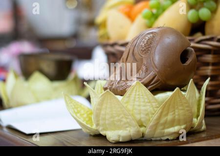 Captivating Serenity: A glimpse of the ornate wooden fish adorning a corner in an ancient Chinese temple Stock Photo