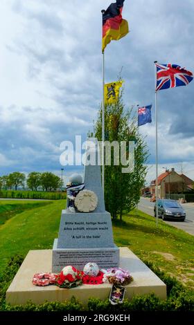 The memorial carries the words A Lull in the Hate and refers to the football match played between the Germans and the British at Christmas 1914. Here, as elsewhere around the village, footballs are placed during ceremonies. The Peace Village has student accommodation for up 165 students in 43 studios. The first stone was laid by Irish Prime Minister Bertie Ahern in June 2006. Stock Photo