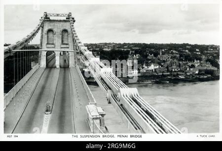 The Menai Suspension Bridge between the island of Anglesey and the mainland of Wales, designed by Thomas Telford. Stock Photo