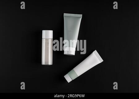 Set of skin care cosmetic products in plastic bottles with blank labels. Eco branding SPA procedures for the face. Mockup Stock Photo