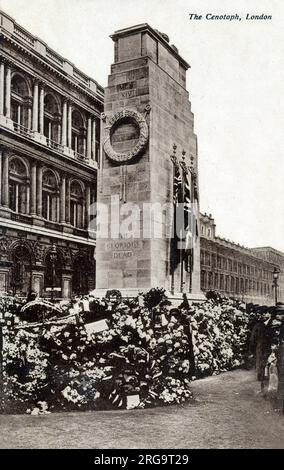 The Cenotaph, London - surrounded by memorial wreaths laid during the Remembrance Day ceremonies. Stock Photo