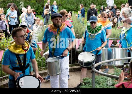 Drummers in the parade at Art in the Park, Leamington Spa, Warwickshire, UK Stock Photo