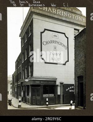 Photograph of Bulls Head PH, East Smithfield (Old), London. The main side of the print (shown here) depicts: Side on view of the pub.  The back of the print (available on request) details: Nothing for the Bulls Head, East Smithfield (Old), London E1W 1LA. As of July 2018 . Damaged by enemy action then partially rebuilt Stock Photo