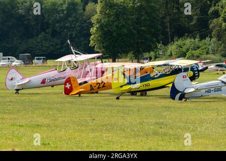 Speck-Fehraltorf, Zurich, Switzerland, July 1, 2023 Different acrobatic aircraft are parking on the grass field Stock Photo