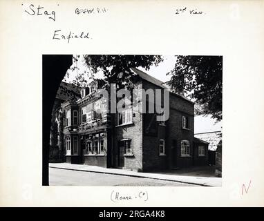 Photograph of Stag PH, Enfield, Greater London. The main side of the print (shown here) depicts: Right face on view of the pub.  The back of the print (available on request) details: Nothing for the Stag, Enfield, Greater London EN2 6PH. As of July 2018 . Punch Taverns Stock Photo
