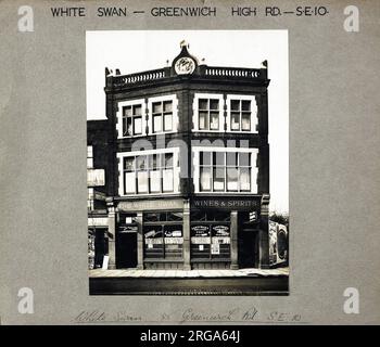 Photograph of White Swan PH, Greenwich, London. The main side of the print (shown here) depicts: Face on view of the pub.  The back of the print (available on request) details: Nothing for the White Swan, Greenwich, London SE10 8JL. As of July 2018 . Demolished Stock Photo
