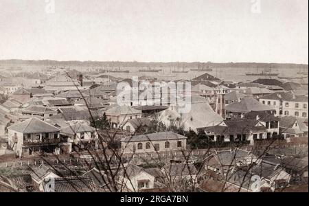 Vintage 19th century photograph: Ships along the waterfront, rooftop view, Yokohoma, Japan Stock Photo