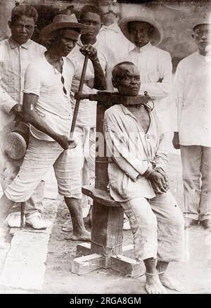 c.1880s South East Asia - possibly the  Philippines - death by strangling - execution with a garotte Stock Photo