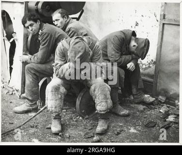 Vintage World War II photograph - exhausted German prisoners, Western front. Stock Photo