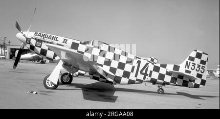 North American P-51D Mustang N335, 'BARDAHL II', race number '14' at Santa Monica, with sister-ship N335J just visible parked alongside.  built as P-51D-30-NA 44-72902 for the United States Army Air Force (USAAF) 7June 1947: Delivered to Royal Canadian Air Force as 9564.20 September 1960: Struck off charge.25 February 1957-1960: James H. FeFuria-Fred Ritts-Intercontinental Airways, Canastota, NY, February 25, 1957-1960, registered as N6343T, but stored at Carberry, Manitoba.10 May 1960-1964 Aero Enterprises, Elkhart, IN.17 April 1964-1973: E.D. Weiner, Santa Monica, CA., registered as N335, ra Stock Photo