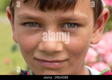 August 8, 2023, Kulgam, Jammu and Kashmir, India: A Kashmiri boy adorned in traditional attire take part in the inaugural 'Veshaw Literary Festival' in Kulgam, Southern Kashmir. Celebrating the region's rich heritage of ancient temples, Sufi saints, and artistic prowess, the event highlights the captivating world of Kashmiri culture and the narratives of skilled artisans. (Credit Image: © Adil Abbas/ZUMA Press Wire) EDITORIAL USAGE ONLY! Not for Commercial USAGE! Stock Photo