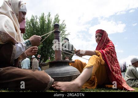 August 8, 2023, Kulgam, Jammu and Kashmir, India: Kashmiri children adorned in traditional attire take part in the inaugural 'Veshaw Literary Festival' in Kulgam, Southern Kashmir. Celebrating the region's rich heritage of ancient temples, Sufi saints, and artistic prowess, the event highlights the captivating world of Kashmiri culture and the narratives of skilled artisans. (Credit Image: © Adil Abbas/ZUMA Press Wire) EDITORIAL USAGE ONLY! Not for Commercial USAGE! Stock Photo