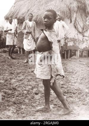 1940s East Africa - Uganda - Banyankole tribal group - Bahima cattle herder boy Photograph by a British army recruitment officer stationed in East Africa and the Middle East during World War II Stock Photo