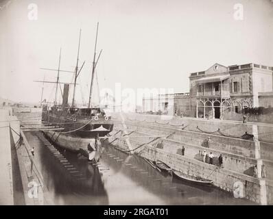 Vintage 19th century photograph: ship in dry dock, Egypt, probably on the Suez Canal. Stock Photo