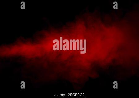 Orange and red steam on a black background. Copy space. Stock Photo