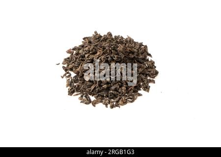 Dried tea leaves isolated on a white background. Top view. Stock Photo