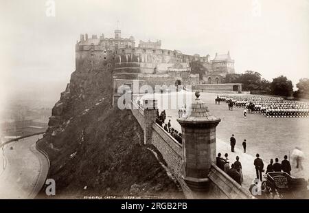 19th century vintage photograph: view of a military parade in the grounds of Edinburgh Castle, Scotland., c.1880's. Stock Photo