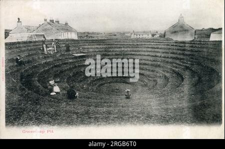 Gwennap Pit near Redruth, Cornwall, where Methodist John Wesley preached to massive congregations 18 times between 1762 and 1789. The neat turf steps and seats were carved by the local populace following Wesley's death. Stock Photo