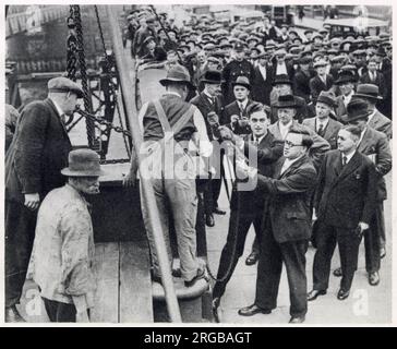 In the 1930s London County Council decided to demolish the bridge and replace it with a new structure designed by Sir Giles Gilbert Scott. Photograph showing Mr. Herbert Morrison, leader of the London Country Council, removing the first stone from Waterloo Bridge. Stock Photo