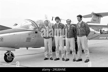 Austrian Air Force - SAAB 105O, of the 'Karo AS' aerobatic team, with the pilots posing in front one of their aircraft. Karo AS' was formed in 1975, flying four SAAB 105O trainers, but disbanded in 1984. Stock Photo