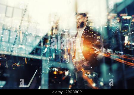 Thoughtful hipster businessman in the office. Double exposure effects Stock Photo