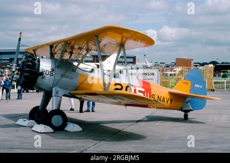 Boeing-Stearman PT-17 Kaydet G-BRUJ (msn 75-4299, Model A75N1, 42-16136 / '6136'), painted as a United States Navy (USN) N2S-3, call-sign '205', with fictional BuAer number '3166', at Woodford on 24 June 1995. Stock Photo