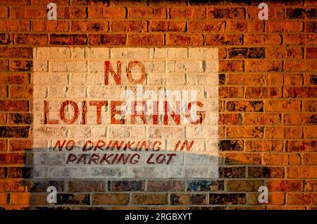 A “No Loitering” sign is painted on the wall at Gran-Pak 2 gas station and convenience store, Aug. 4, 2023, in Grand Bay, Alabama. Stock Photo