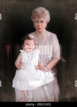 Queen Mary (consort of King George V) holding her grand-daughter, Princess Elizabeth of York (later Queen Elizabeth II), shortly before her first birthday. The princess was being cared for by her grandparents while the Duke and Duchess of York were on tour in Australia. King George and Queen Mary were reputedly distant from their own children, but proved adoring grandparents to the princess, known as 'Lilibet' within the family. Stock Photo